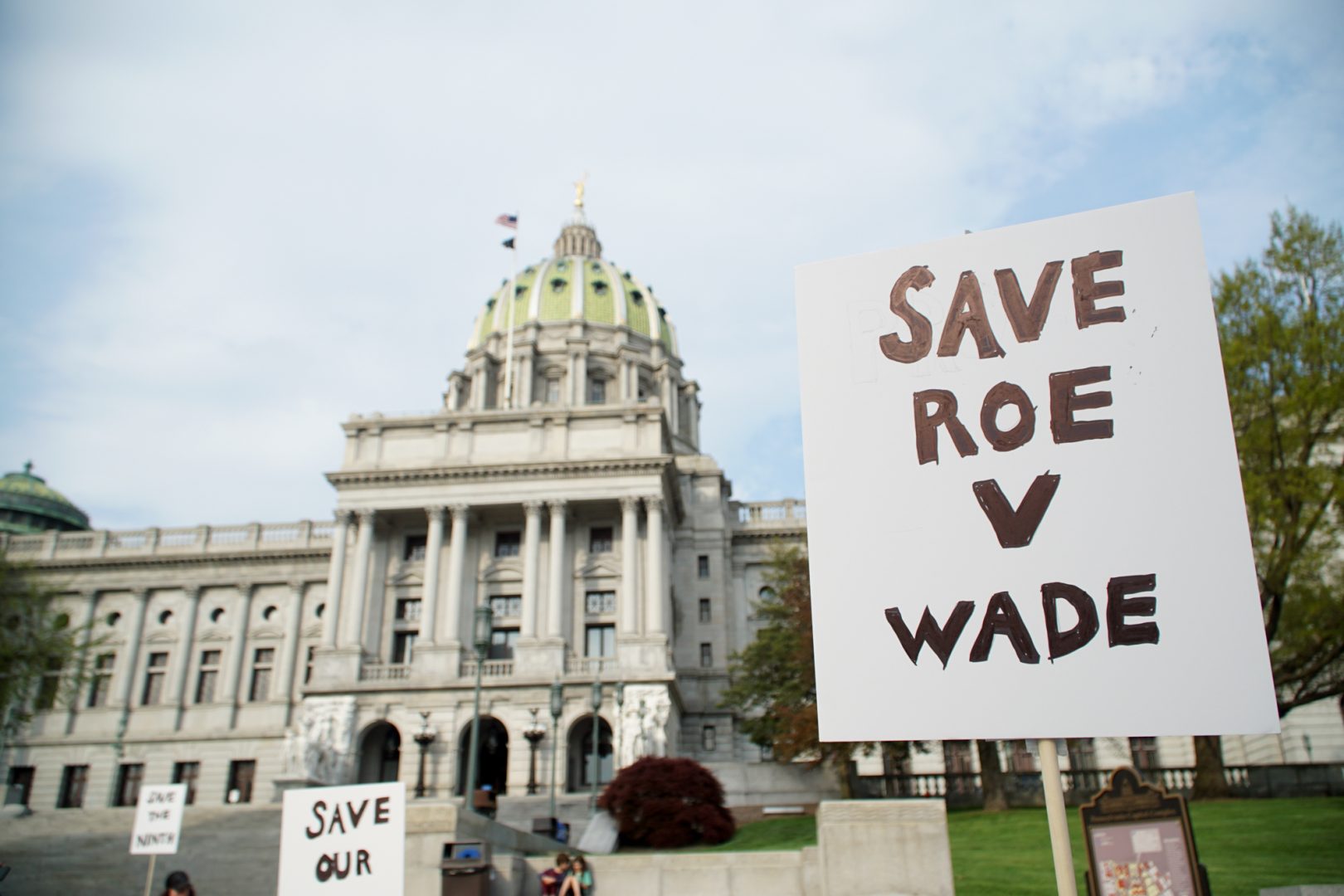 More than 30 people gathered outside of the state Capitol on May 3, 2022 to protest the leaked draft U.S. Supreme Court opinion that would reverse Roe v. Wade.