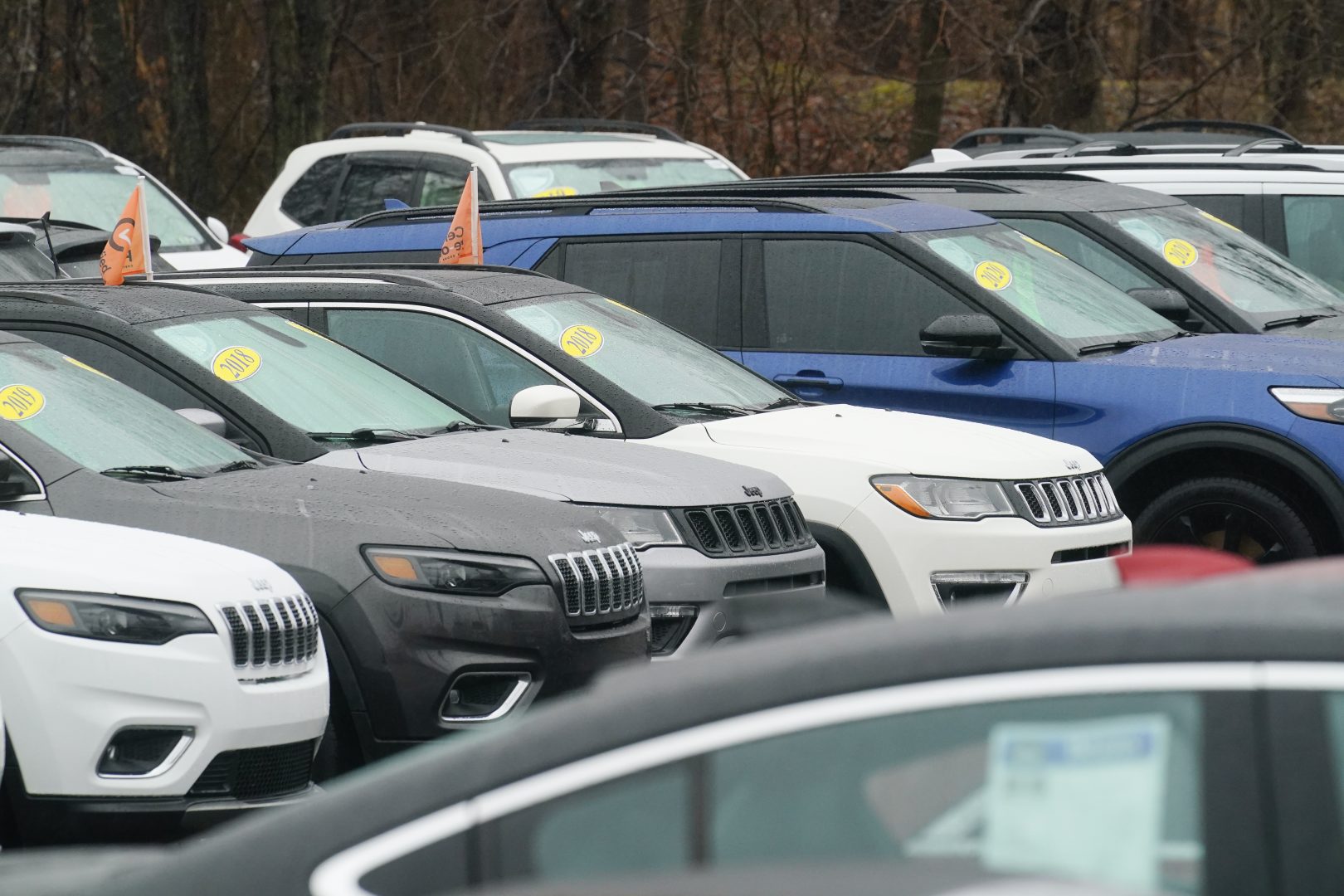 Used cars for sale on a lot at a dealership in Doylestown, Pa., Friday, Feb. 4, 2022. 