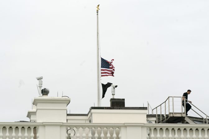 An American flag flies at half-staff at the White House, Tuesday, May 24, 2022, in Washington, to honor the victims of the mass shooting at Robb Elementary School in Uvalde, Texas.