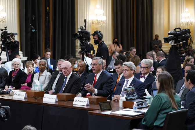 Georgia Secretary of State Brad Raffensperger, center, testifies as the House select committee investigating the Jan. 6 attack on the U.S. Capitol continues, at the Capitol in Washington, Tuesday, June 21, 2022, as Arizona House Speaker Rusty Bowers, left, and Georgia Deputy Secretary of State Gabriel Sterling, right, look on.