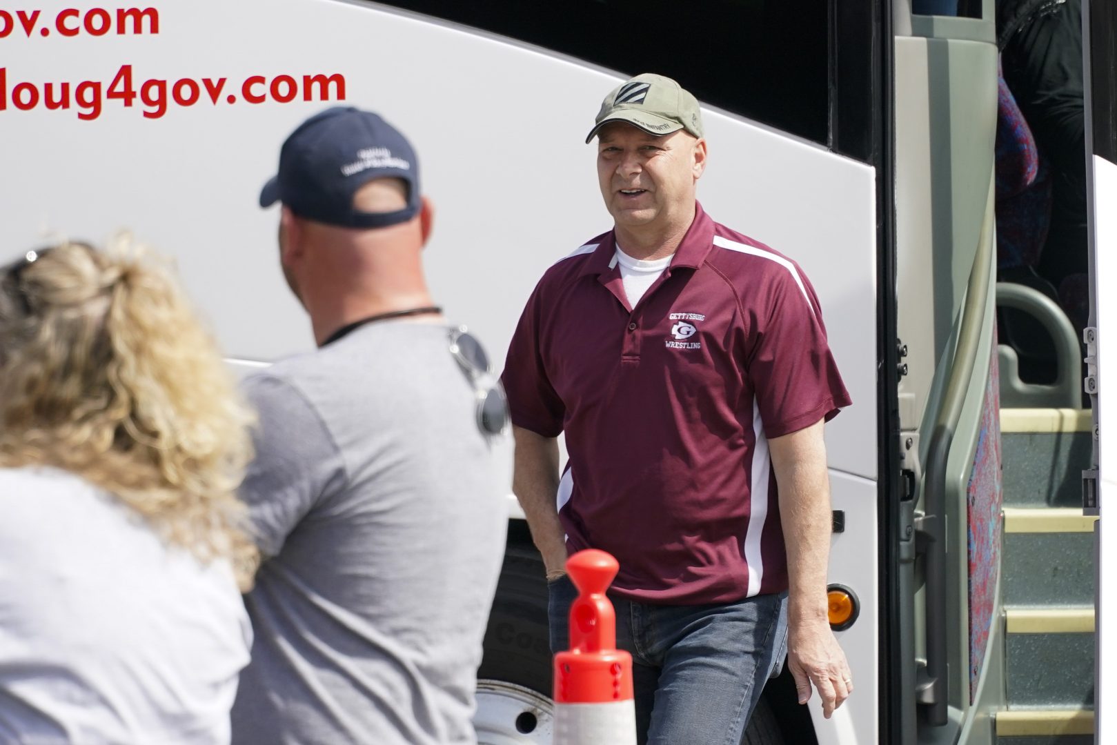 Pennsylvania state Sen. Doug Mastriano, R-Franklin, right,,a Republican running for Governor of Pennsylvania, arrives at a campaign stop Tuesday, May 10, 2022, in Portersville, Pa. (AP Photo/Keith Srakocic)