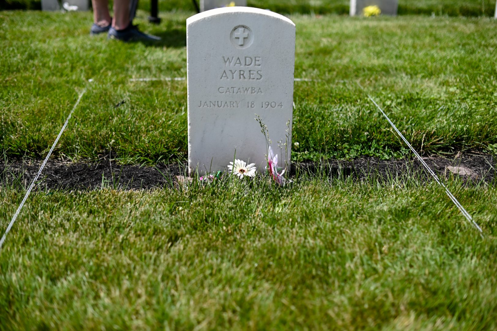 The grave of Wade Ayres as the Office of Army Cemeteries prepare to disinter eight Native American graves at the Carlisle Barracks on June 10, 2022. There children were students at the Carlisle Indian Industrial School operated by the Department of the Interior until 1919.