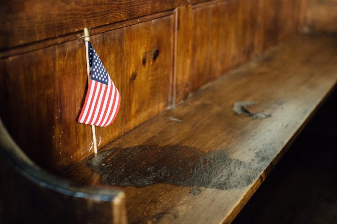 A blood-stained pew in the church at Angoville-au-Plain