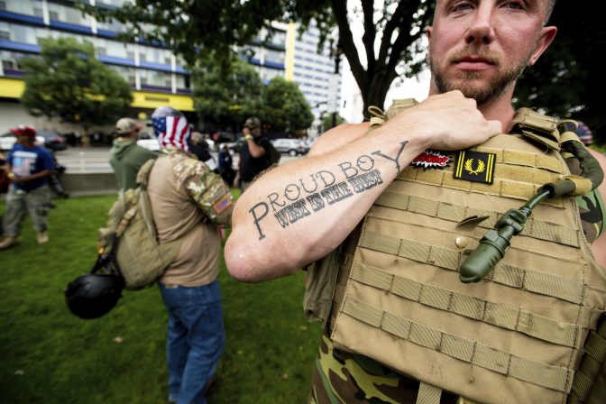 Joseph Oakman, a member of the Proud Boys, wears body armor during an "End Domestic Terrorism" rally in Portland, Ore., on Saturday, Aug. 17, 2019.
