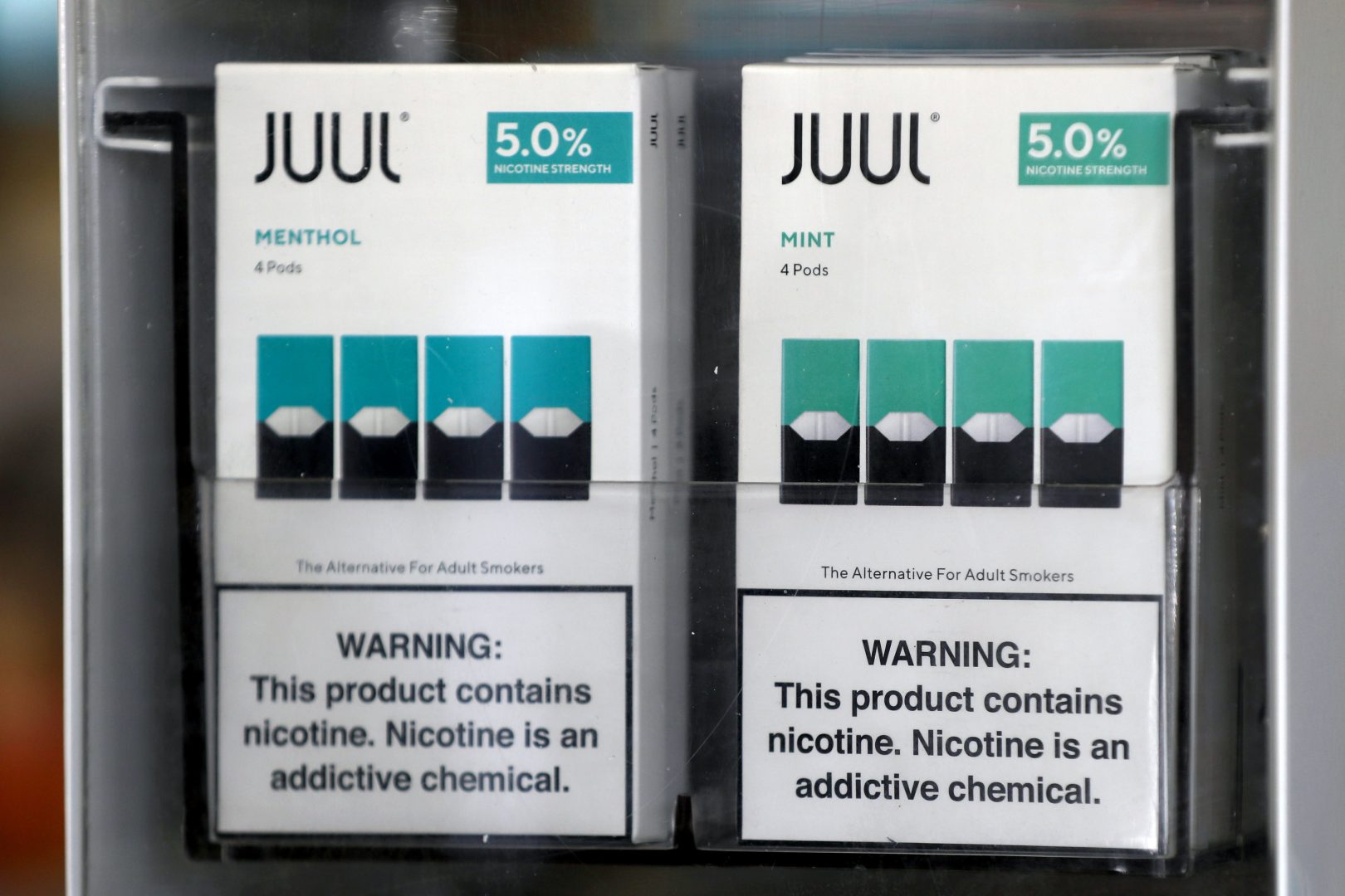 SAN RAFAEL, CALIFORNIA - NOVEMBER 07:  Packages of Juul mint flavored e-cigarettes are displayed at San Rafael Smokeshop on November 07, 2019 in San Rafael, California. Juul, a leading e-cigarette company, announced that it is halting sales of their popular mint flavor e-cigarette after the release of two studies that showed a surge in teen use. 