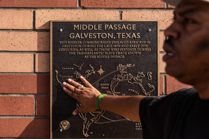 Sam Collins talks about a plaque commemorating the Middle Passage.