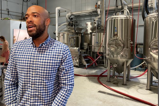 Democratic U.S. Senate candidate Mandela Barnes speaks as he tours Giant Jones Brewery, July 21, 2021, in Madison, Wis.