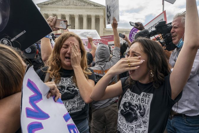 Anti-abortion protesters celebrate following Supreme Court's decision to overturn Roe v. Wade, federally protected right to abortion, in Washington, Friday, June 24, 2022.