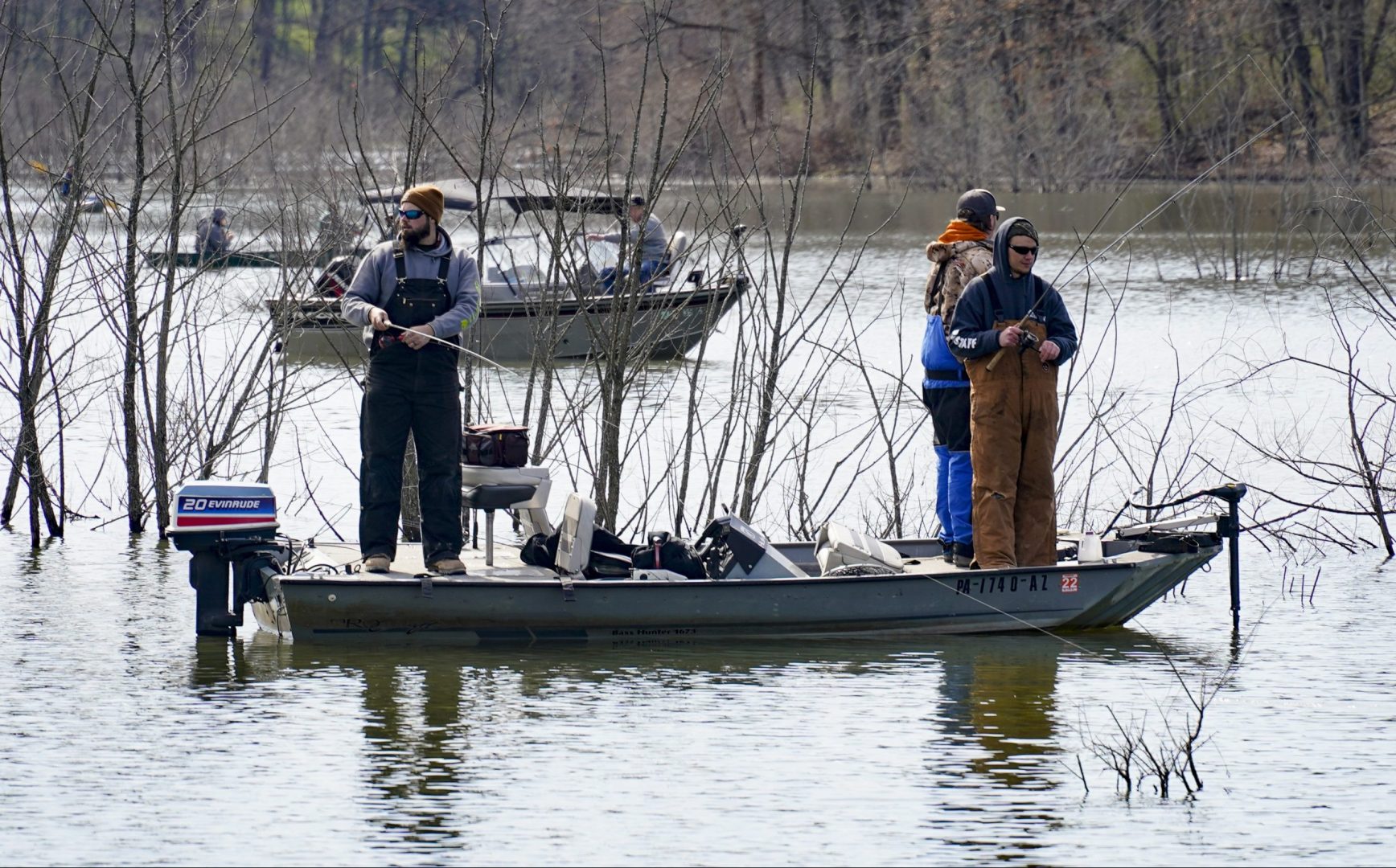 Anglers fish from boats at Glade Run Lake Conservancy, on opening day of trout fishing season in Pennsylvania, Saturday, April 3, 2021, in Valencia, Pa. 