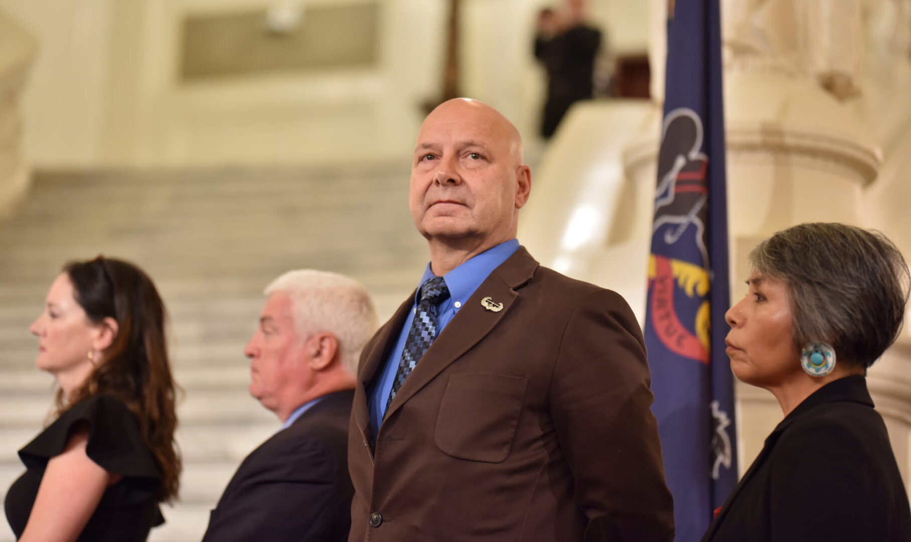 State Sen. Doug Mastriano (R-Franklin), the 2022 Republican candidate for governor, glances into a crowd gathered for a rally celebrating William Penn in the state Capitol rotunda in Harrisburg on July 1, 2022. 