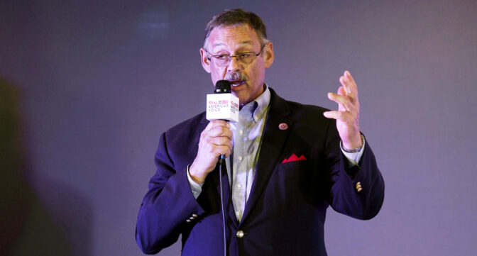 Arizona state Rep. Mark Finchem speaks during an election rally in Richmond, Va., on Oct. 13, 2021. Finchem is now running for Arizona secretary of state, with former President Donald Trump's endorsement. 