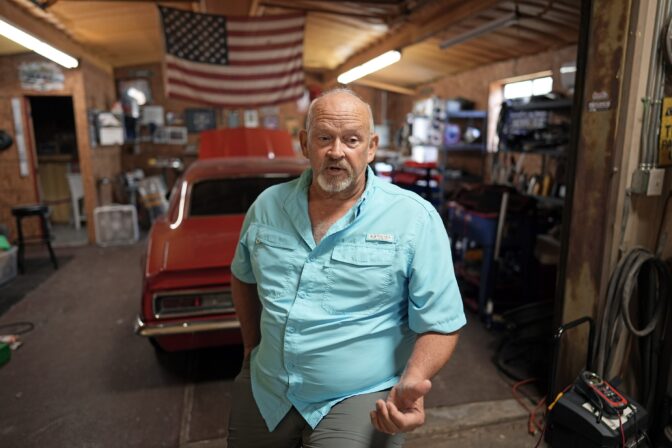 Retired Houston fire captain Russell Harris poses for a photo inside his home workshop on Wednesday, June 22, 2022 in East Bernard, Texas.
