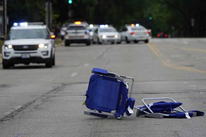 Empty chairs are seen on the street after a mass shooting at the Highland Park Fourth of July parade in downtown Highland Park, Ill., a Chicago suburb on Monday, July 4, 2022.