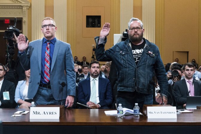 Stephen Ayres, who pleaded guilty last in June 2022 to disorderly and disruptive conduct in a restricted building, left, and Jason Van Tatenhove, an ally of Oath Keepers leader Stewart Rhodes, are sworn in to testify as the House select committee investigating the Jan. 6 attack on the U.S. Capitol holds a hearing at the Capitol in Washington, Tuesday, July 12, 2022.