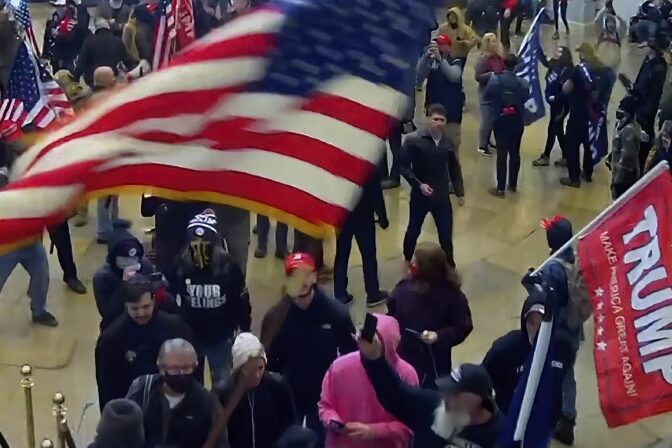 This exhibit from video released by the House Select Committee, shows shows rioters inside the Capitol Rotunda on Jan. 6, displayed at a hearing by the House select committee investigating the Jan. 6 attack on the U.S. Capitol, Thursday, July 21, 2022, on Capitol Hill in Washington.