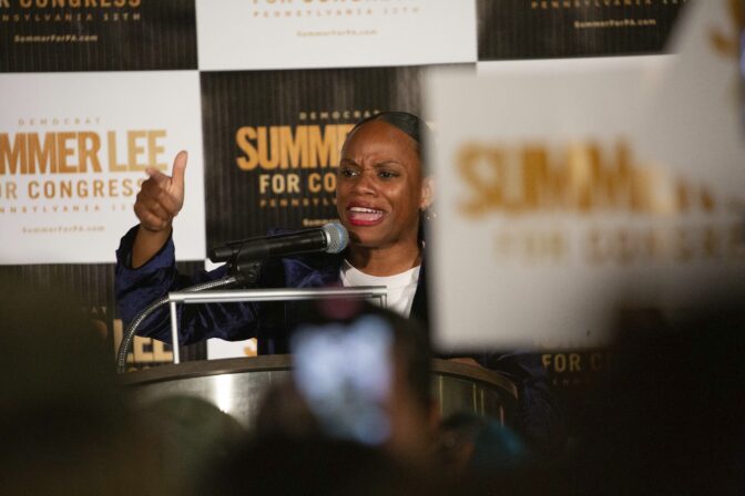 The crowd cheers in support of state Rep. Summer Lee, who is seeking the Democratic Party nomination for Pennsylvania's 12th District U.S. Congressional district, during a campaign event where Sen. Bernie Sanders, I-Vt., endorsed Lee, Thursday, May 12, 2022.