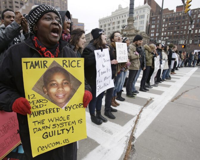 In this November 25, 2014, file photo, protesters block Public Square in Cleveland, during a protest against the police shooting of 12-year-old Tamir Rice.