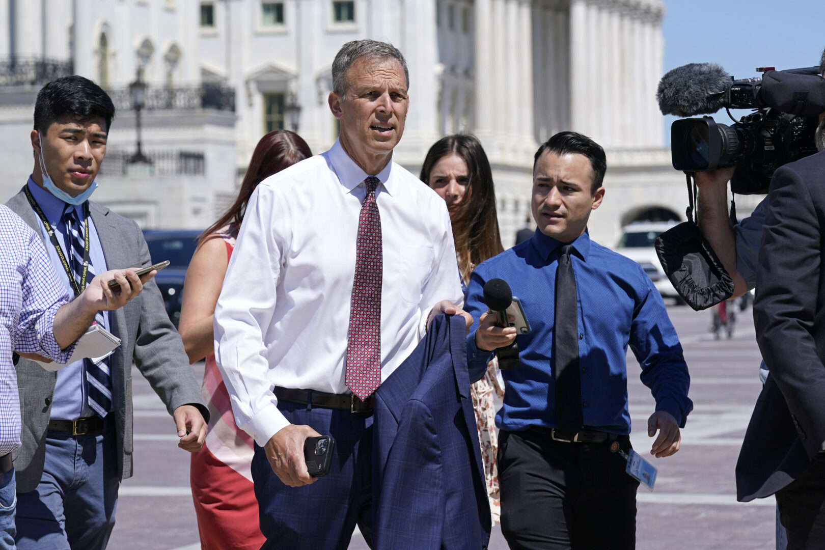 Rep. Scott Perry, R-Pa., is followed by reporters on Capitol Hill in Washington, Friday, Aug. 12, 2022. 