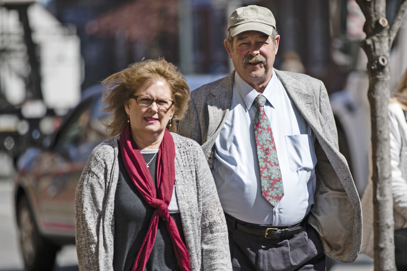 FILE – Deborah Frein, left, and Eugene Michael Frein, right, the parents of Eric Frein, walk to the Chester County Justice Center in West Chester, Pa., March 9, 2017. Pennsylvania may not keep a cache of weapons seized from the parents of Eric Frein, the gunman who killed one state trooper and permanently disabled another eight years ago, a federal appeals court ruled Tuesday, Aug. 30, 2022. Frein's parents sued after authorities refused to return 25 rifles, 10 pistols and two shotguns that were taken from their home in September 2014, days after Frein ambushed the troopers outside a state police barracks in the Pocono Mountains. (AP Photo/Matt Rourke, File)