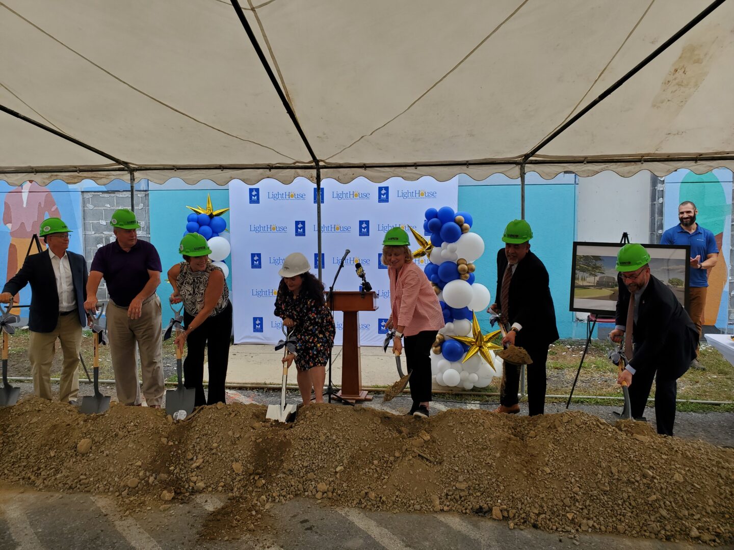 Elected leaders Berks County Commissioner Leinbach, state Sen. Judy Schwank and Reading Mayor Eddie Moran join other supporters in breaking ground at the LightHouse Women & Children's Shelter. 