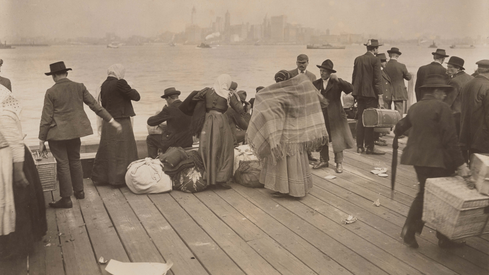 Immigrants waiting to be transferred, Ellis Island, October 30, 1912.