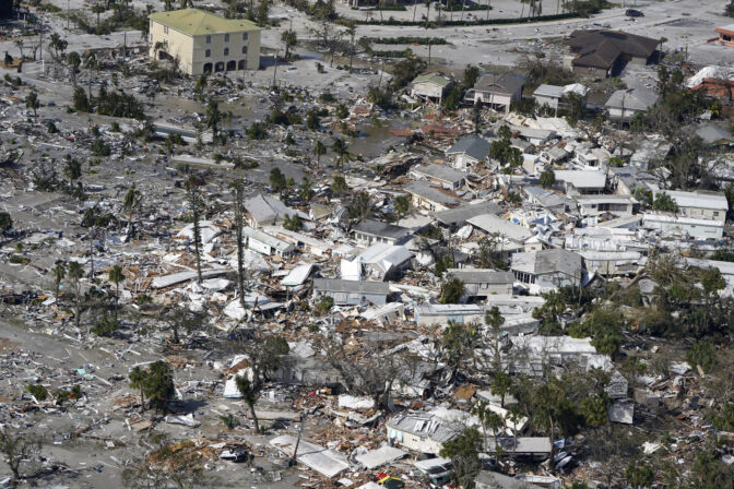 Damaged homes and debris are shown in the aftermath of Hurricane Ian on Sept. 29, 2022, in Fort Myers, Fla.
