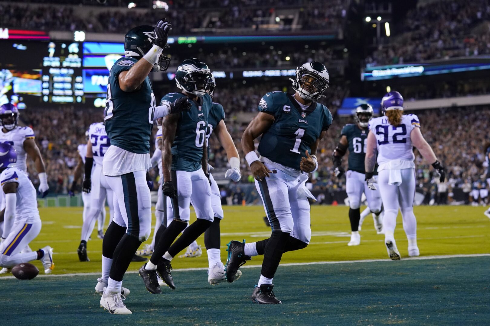 Philadelphia Eagles quarterback Jalen Hurts (1) celebrates after scoring on a 26-yard touchdown run during the first half of an NFL football game against the Minnesota Vikings, Monday, Sept. 19, 2022, in Philadelphia. 