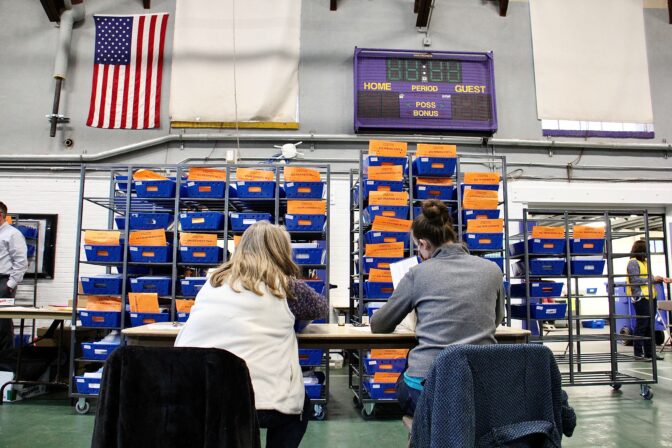 Election workers check ballots one last time before sending them to be scanned and counted in Pennsylvania in November 2020.