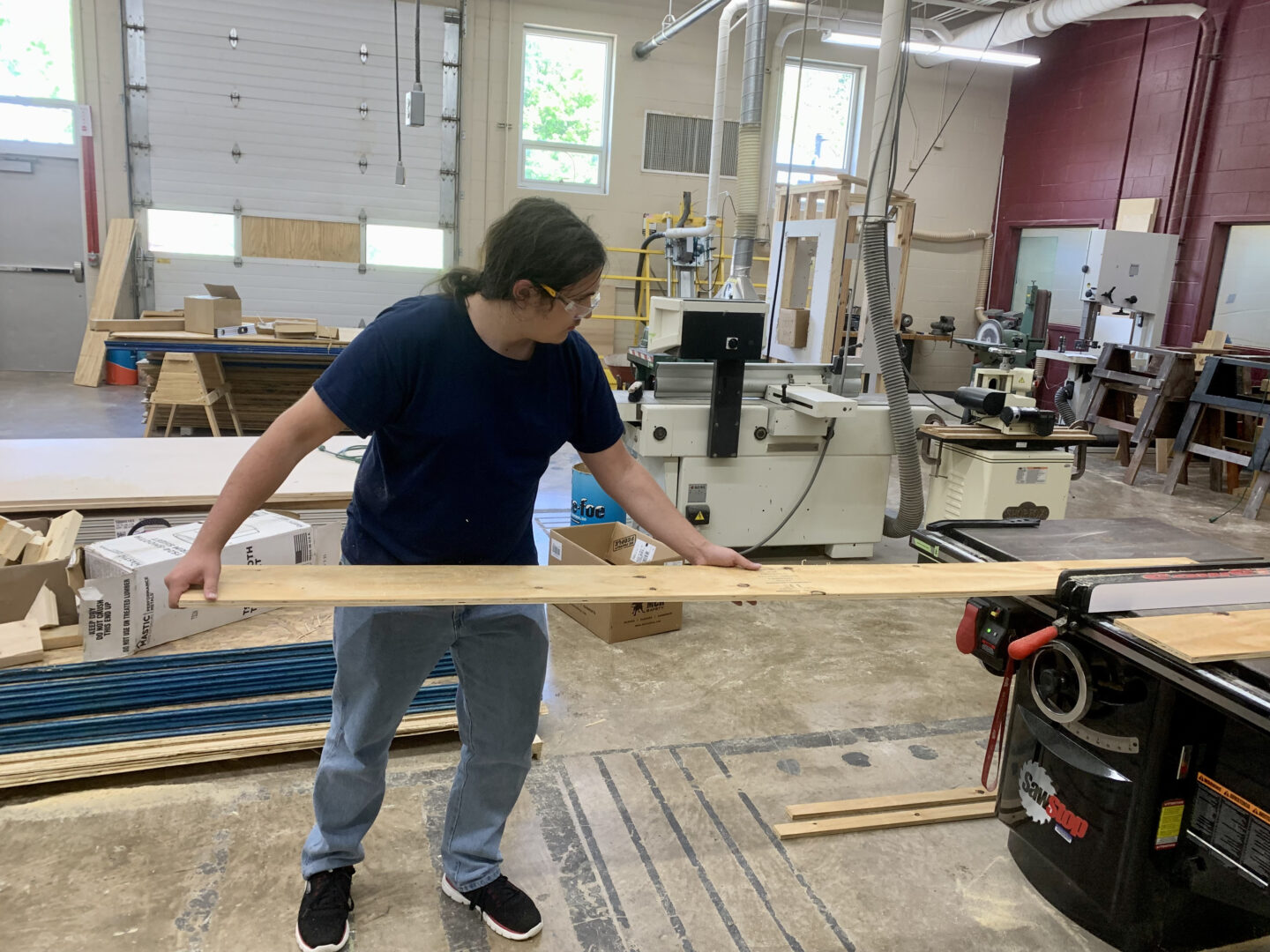 Clearfield County Career and Technology Center student Archere Meek completing a project for his carpentry class.
