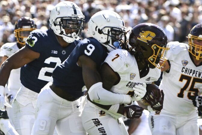Penn State cornerback Joey Porter Jr. (9) tackles Central Michigan running back Lew Nichols III (7) during the second half of an NCAA college football game, Saturday, Sept. 24, 2022, in State College, Pa.