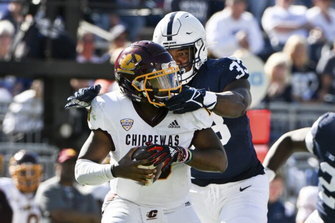 Penn State defensive end Dani Dennis-Sutton (33) sacks Central Michigan quarterback Daniel Richardson (10) during the second half of an NCAA college football game, Saturday, Sept. 24, 2022, in State College, Pa.