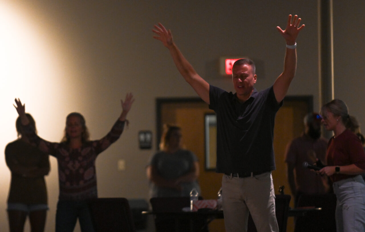 People worship during the service at World Harvest Outreach Church in Chambersburg