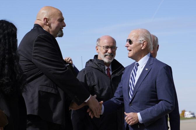 President Joe Biden speaks with Pennsylvania Lt. Gov. John Fetterman