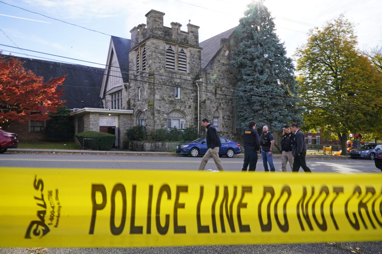 Police investigate the scene outside the Destiny of Faith Church in Pittsburgh,