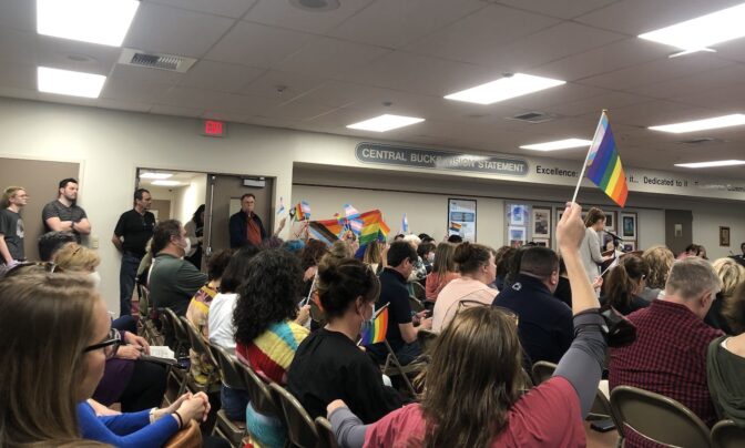 Central Bucks parents raise pride flags in protest of the string of decisions made by administration and district leadership. in May 2022