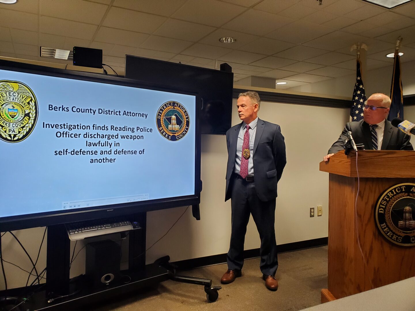 From left, Berks County Detective Michael J. Gombar and Berks County District Attorney John T. Adams review the Sept. 14 incident in which a Reading Police officer shot a suspect with a warrant out for his arrest. 