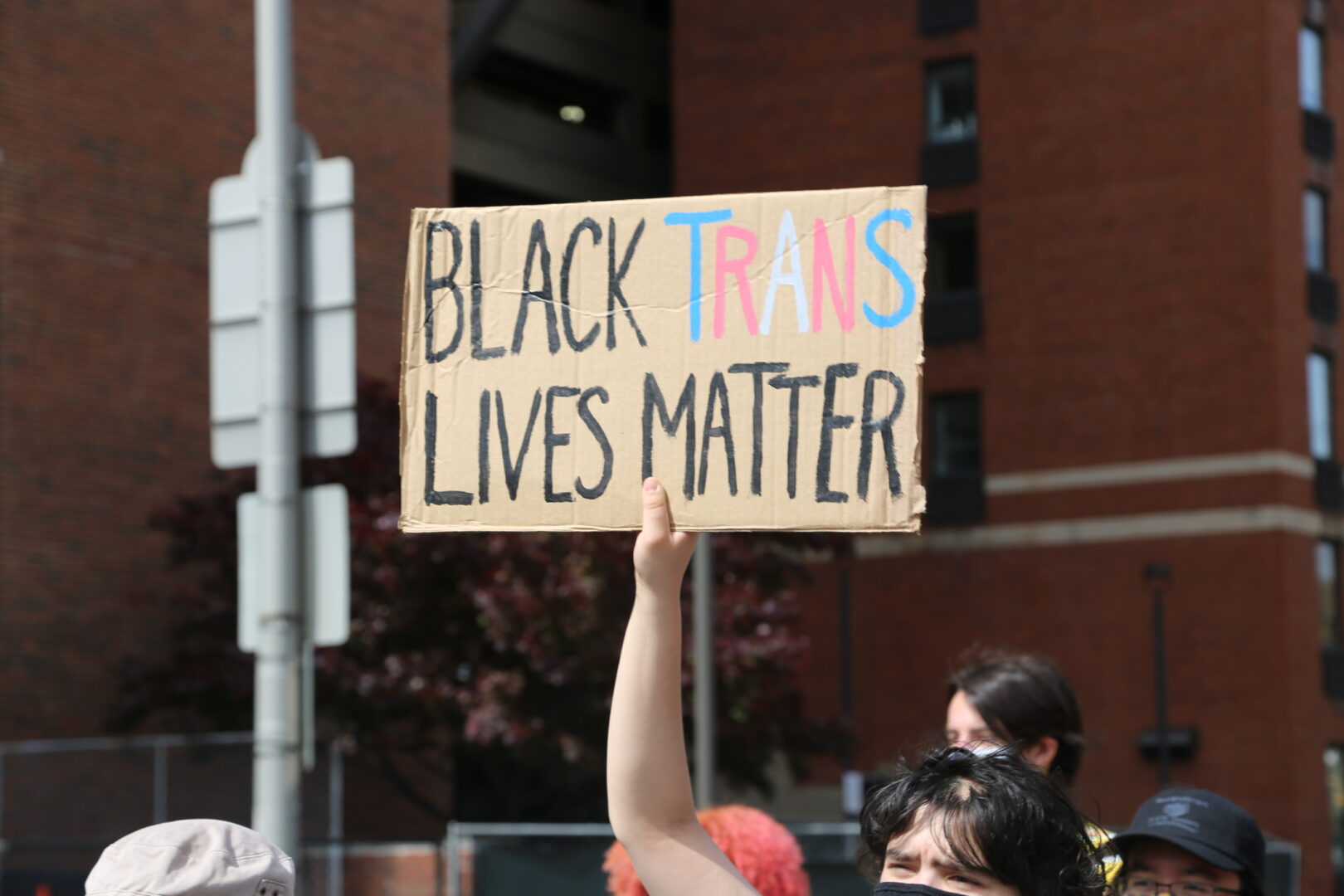 A sign in support of Black trans lives during a demonstration on Sunday, May 2, 2021.
