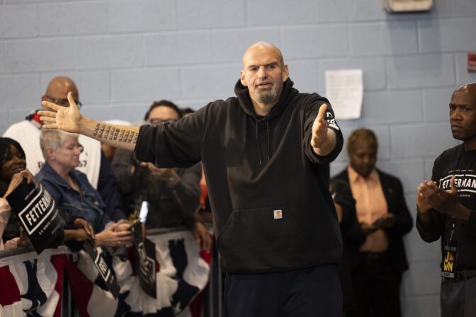 Pennsylvania Lt. Gov. John Fetterman, a Democratic candidate for U.S. Senate, meets with supporters as he leaves his event in Philadelphia, in this file photo from Sept. 24, 2022.