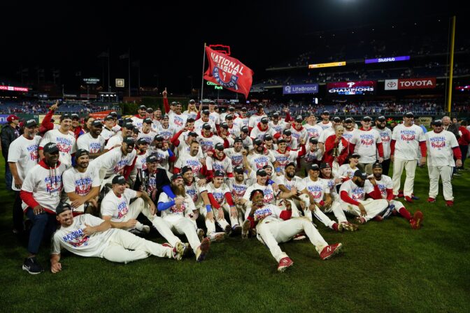 The Philadelphia Phillies pose after winning the baseball NL Championship Series against the San Diego Padres in Game 5 on Sunday, Oct. 23, 2022, in Philadelphia.