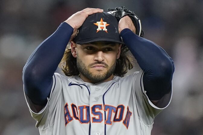 Houston Astros starting pitcher Lance McCullers Jr. reacts after giving up a run to the New York Yankees during the first inning of Game 4 of an American League Championship baseball series, Sunday, Oct. 23, 2022, in New York.