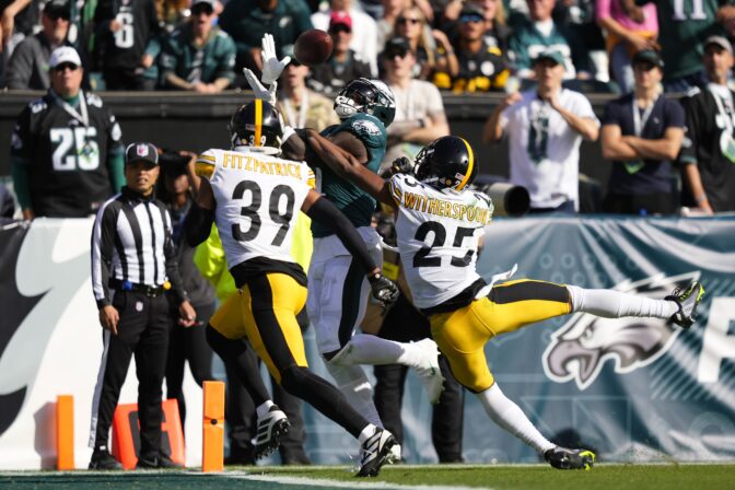 Philadelphia Eagles wide receiver A.J. Brown (11) catches a touchdown pass against Pittsburgh Steelers safety Minkah Fitzpatrick (39) and cornerback Ahkello Witherspoon (25) during the first half of an NFL football game between the Pittsburgh Steelers and Philadelphia Eagles, Sunday, Oct. 30, 2022, in Philadelphia.