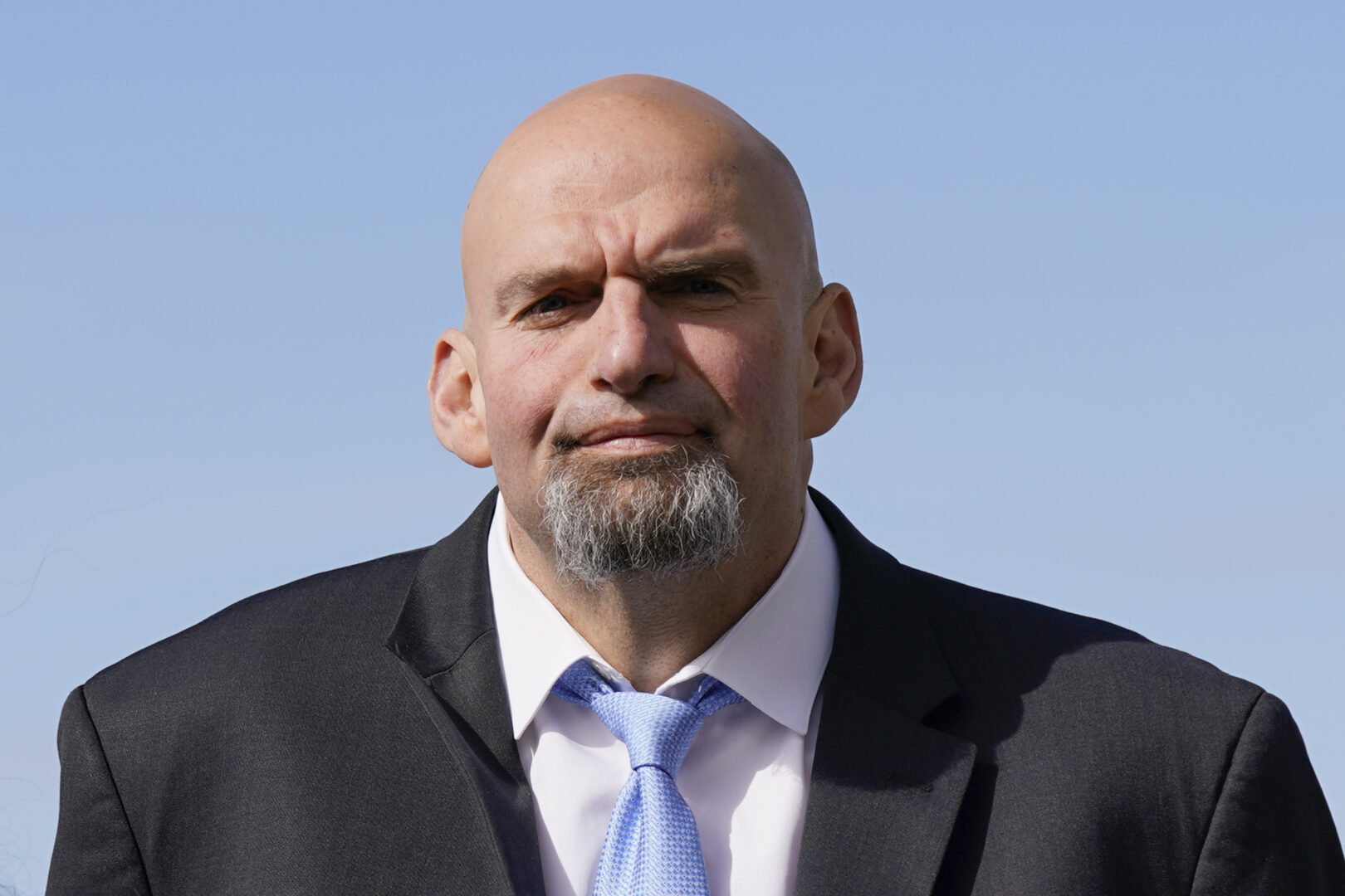 FILE - Pennsylvania Lt. Gov. John Fetterman, a Democratic candidate for U.S. Senate, stands on the tarmac after greeting President Joe Biden, on Oct. 20, 2022, at the 171st Air Refueling Wing at Pittsburgh International Airport in Coraopolis, Pa. (AP Photo/Patrick Semansky, File)