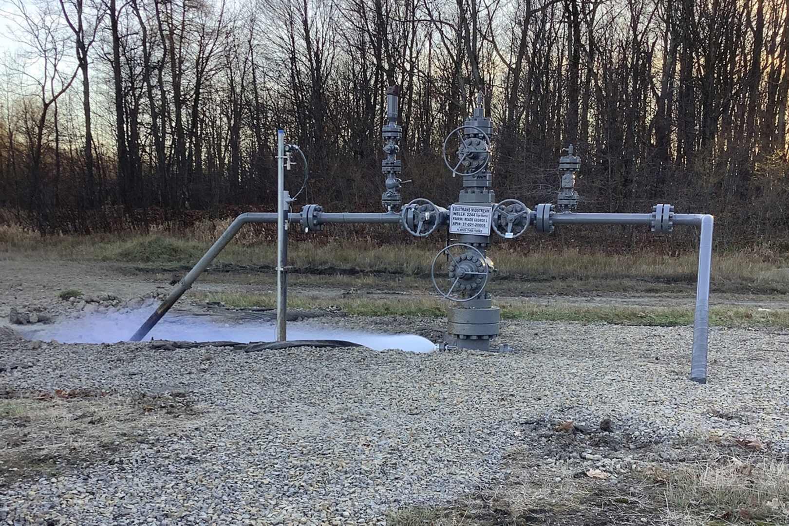 This Nov. 7, 2022, photo, released by the Pennsylvania Department of Environmental Protection shows a methane leak at a well owned by Equitrans Midstream at their Rager Mountain storage facility near Jackson Township, Pa. A vent at the underground natural gas storage well in Western Pennsylvania has been spewing massive amounts of planet-warming methane into the atmosphere for more than 11 days. (Pennsylvania Department of Environmental Protection via AP)