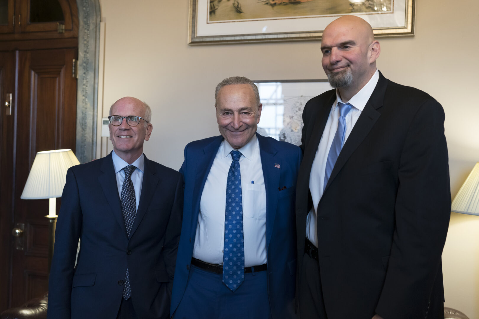 FILE - Senate Majority Leader Chuck Schumer, D-N.Y., center, welcomes Senator-elect Peter Welch, D-Vt., left, and Senator-elect John Fetterman, D-Pa., whose victories helped give Democrats the majority in the next Congress, at the Capitol in Washington, Tuesday, Nov. 15, 2022. (AP Photo/J. Scott Applewhite, File)