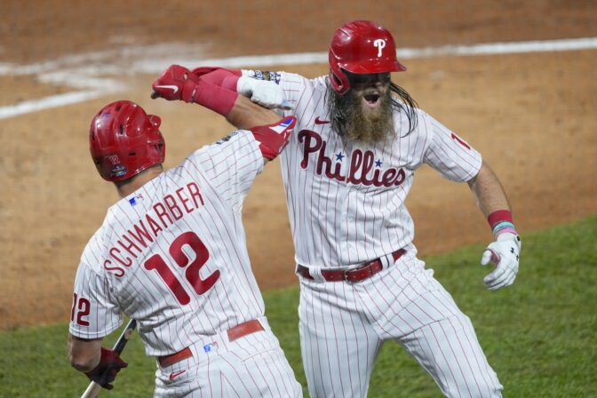 Philadelphia Phillies' Brandon Marsh celebrates his home run during the second inning in Game 3 of baseball's World Series between the Houston Astros and the Philadelphia Phillies on Tuesday, Nov. 1, 2022, in Philadelphia.