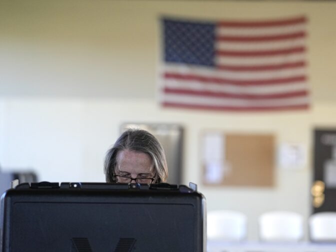 A voter cast her vote at the Lake County Fairgrounds, Tuesday, Nov. 8, 2022, in Crown Point, Ind.