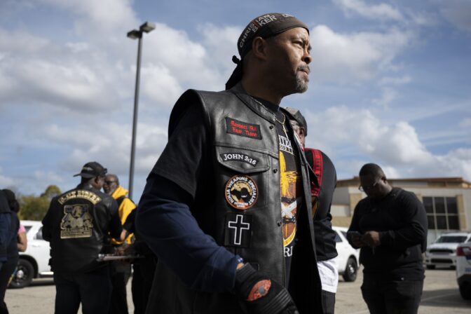 Rev. Alyn Waller of Enon Tabernacle Baptist Church looks on after rallying fellow bikers for a "Black Bikers Vote" procession, Saturday, Nov. 5, 2022, in Philadelphia. (
