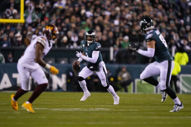 Philadelphia Eagles quarterback Jalen Hurts (1) scrambles during the second half of an NFL football game against the Washington Commanders, Monday, Nov. 14, 2022, in Philadelphia.