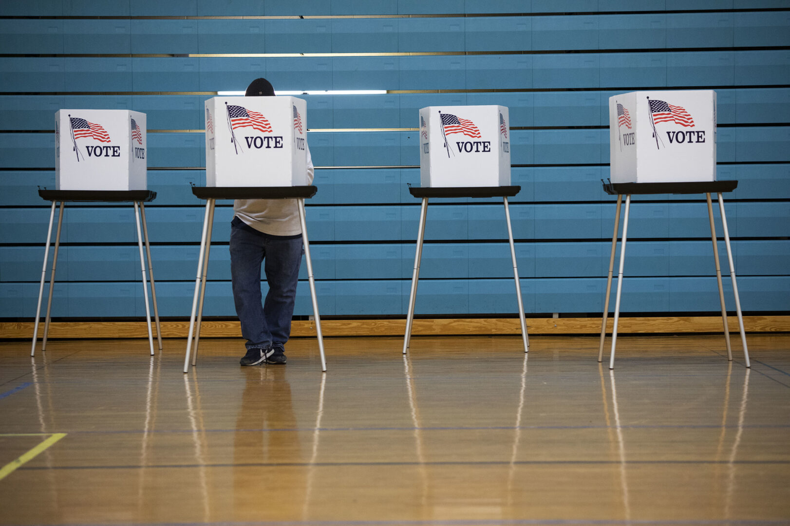 LANSING, MI - NOVEMBER 08: A man votes in the 2022 midterm election on Election Day on November 8, 2022 in Lansing, Michigan. After months of candidates campaigning, Americans are voting in the midterm elections to decide close races across the nation. (Photo by Bill Pugliano/Getty Images)