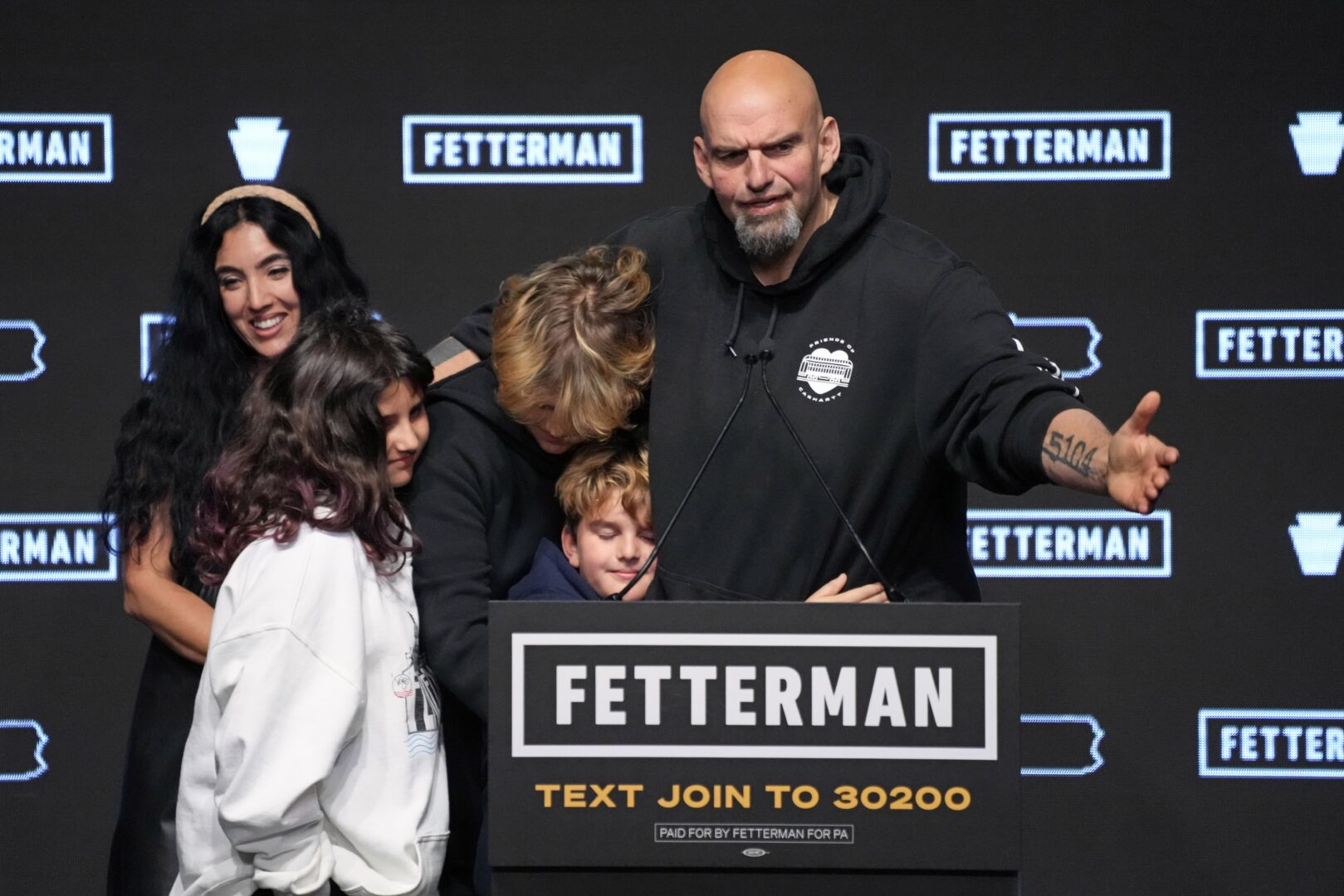 Pennsylvania Lt. Gov. John Fetterman, Democratic candidate for U.S. Senate from Pennsylvania, right, is joined by his family after addressing supporters at an election night party in Pittsburgh, Wednesday, Nov. 9, 2022. 